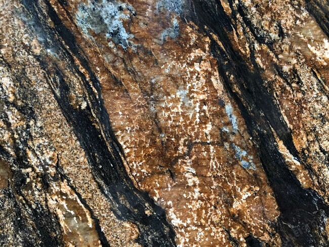 Luxury Polished Magma Gold Granite Slab — product view 3